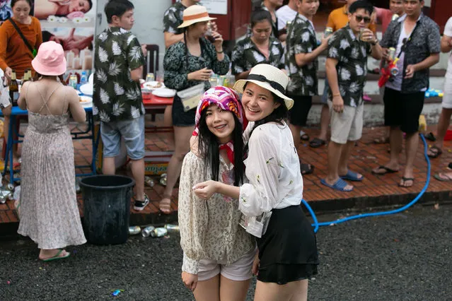 Girls celebrate the Songkran Festival or the Lao New Year, in Luang Prabang, Laos on April 15, 2021. (Photo by Xinhua News Agency/Rex Features/Shutterstock)