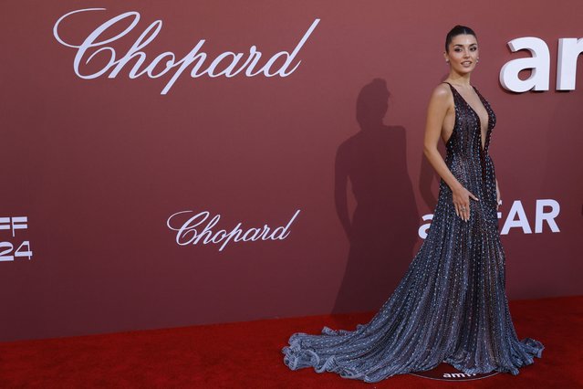 Turkish actress Hande Ercel arrives to attend the annual amfAR Cinema Against AIDS Cannes Gala at the Hotel du Cap-Eden-Roc in Cap d'Antibes, southern France, on the sidelines of the 77th Cannes Film Festival, on May 23, 2024. (Photo by Clodagh Kilcoyne/Reuters)