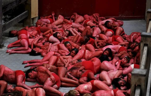 Animal rights protesters demonstrate for the abolition of bull runs and bullfights, three days before the start of the famous running of the bulls San Fermin festival in Pamplona, northern Spain, July 4, 2015. (Photo by Eloy Alonso/Reuters)