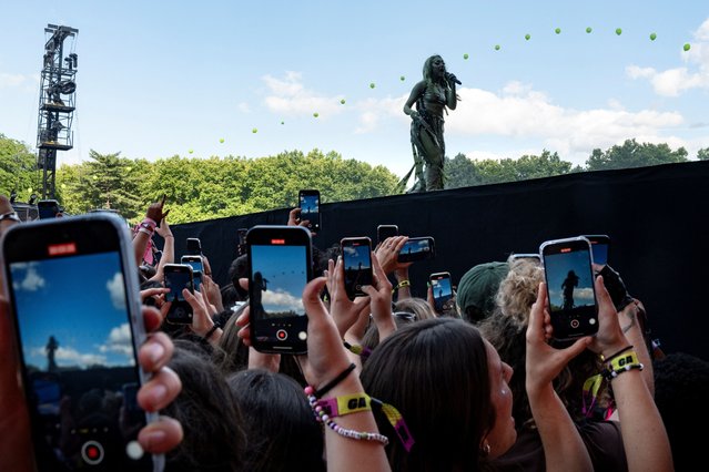 Fans record videos on their phones as Chappell Roan performs at the Governors Ball music festival at Corona Park in the Queens borough of New York City, U.S., June 9, 2024. (Photo by Cheney Orr/Reuters)
