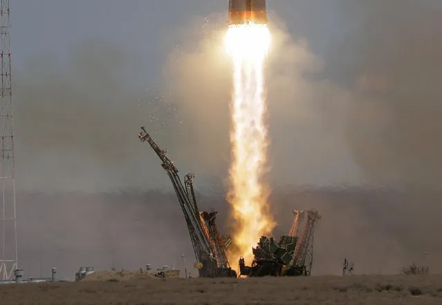 The Soyuz-FG rocket booster with Soyuz MS-04 spacecraft carrying a new crew to the International Space Station, ISS, blasts off at the Russian leased Baikonur cosmodrome, Kazakhstan, Thursday, April 20, 2017. The Russian rocket carries U.S. astronaut Jack Fischer and Russian cosmonaut Fyodor Yurchikhin. (Photo by Dmitri Lovetsky/AP Photo)