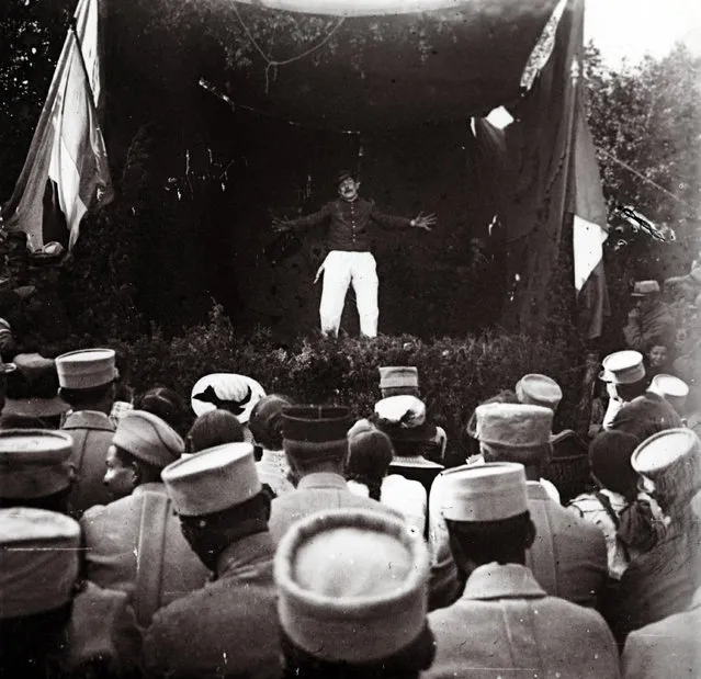 An archive picture taken shows soldiers attending an entertainment show at Suippes, on the Champagne Front, Eastern France in 1915. (Photo by Collection Odette Carrez/Reuters)