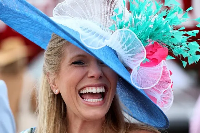Fans enjoy themselves in the paddock area at the Kentucky Derby at Churchill Downs on May 07, 2022 in Louisville, Kentucky. (Photo by Andy Lyons/Getty Images)