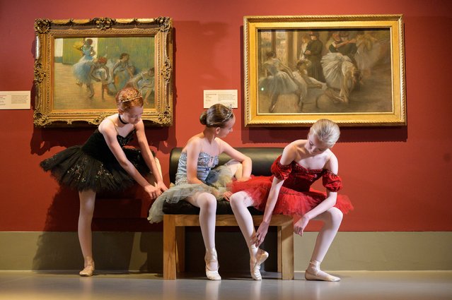 Pixie Howitt,left, Jada-Jo Branney and Darcey McKechnie, pupils at the Dance School of Scotland, pose alongside works in the exhibition Discovering Degas: Collecting in the Time of Sir William Burrell, in Glasgow on September 3, 2024. (Photo by Wattie Cheung/The Times)