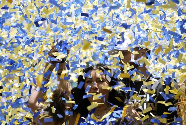Stephen Curry #30 of the Golden State Warriors and wife Ayesha celebrate with his NBA Finals Most Valuable Player Award during the Golden State Warriors Victory Parade on June 20, 2022 in San Francisco, California. (Photo by Thearon W. Henderson/Getty Images)