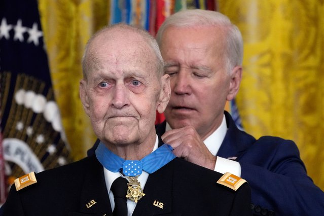 President Joe Biden awards the Medal of Honor to Capt. Larry Taylor, an Army pilot from the Vietnam War who risked his life to rescue a reconnaissance team that was about to be overrun by the enemy, during a ceremony Tuesday, September 5, 2023, in the East Room of the White House in Washington. (Photo by Jacquelyn Martin/AP Photo)