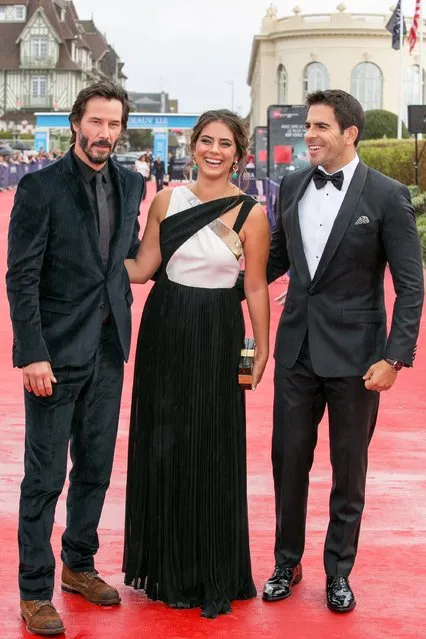 Actors Keanu Reeves, Lorenza Izzo and director Eli Roth attend the “Knock Knock” Premiere during the 41st Deauville American Film Festival on September 5, 2015 in Deauville, France. (Photo by Marc Piasecki/Getty Images)