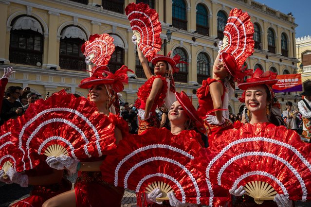 People participate in the Macao International Parade on Sunday, March 23, 2025. (Photo by Eduardo Leal/AFP Photo)