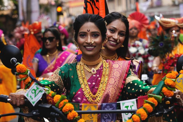 Women dressed in traditional attire participate in a procession to mark Gudi Padwa or the Marathi New Year in Mumbai, India, Sunday, March 30, 2025. (Photo by Rajanish Kakade/AP Photo)