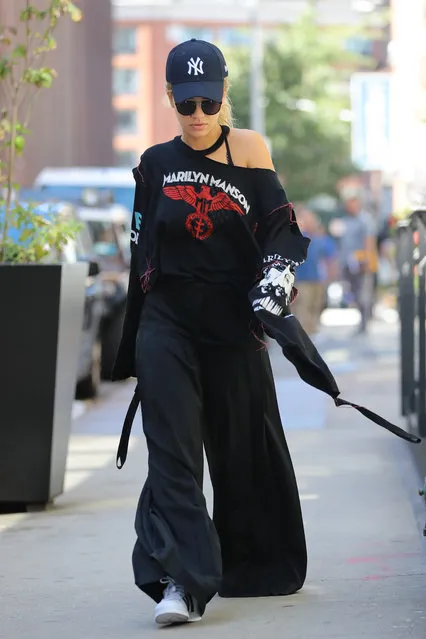 Rita Ora Keeps a Relaxed look in a Marilyn Manson T-shirt as she heads out of her home in New York on August 30, 2016. (Photo by NIGNY/Splash News)
