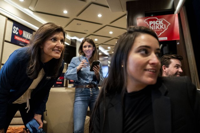 Republican Presidential candidate Nikki Haley looks out the window toward the rally stage with staff onboard her campaign bus between rallies in Myrtle Beach, South Carolina on Thursday February 22, 2024. (Photo by Melina Mara/The Washington Post)
