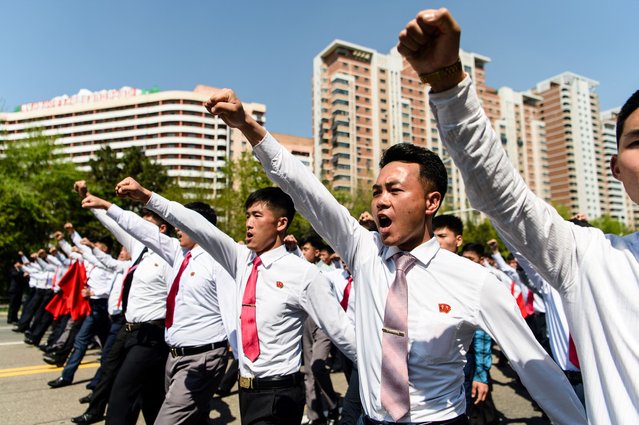 Students participate in a commemorative march near the Arch of Triumph in Pyongyang on April 25, 2025, to mark the 93rd anniversary of the Korean People's Revolutionary Army. (Photo by Kim Won Jin/AFP Photo)