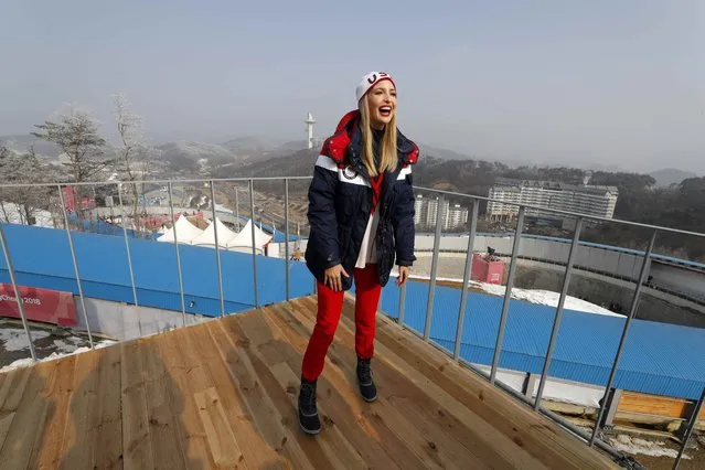 US President Donald Trump' s daughter and senior White House adviser Ivanka Trump poses for a photo on a balcony of the VIP tent at the Olympic sliding centre before the ski jump tower, during the men' s four- man bobsleigh event of the Pyeongchang Winter Olympic games in Pyeongchang on February 25, 2018. (Photo by Eric Gaillard/Reuters)