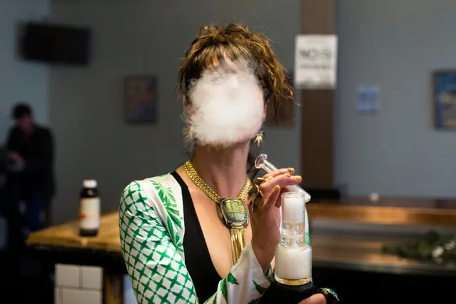Elise McRoberts exhales after using a full spectrum oil vaporizer at the new Magnolia cannabis vape lounge in Oakland, California, U.S. April 20, 2018. Friday marked the first “4/20” since the sale of recreational marijuana became legal on January 1. (Photo by Elijah Nouvelage/Reuters)