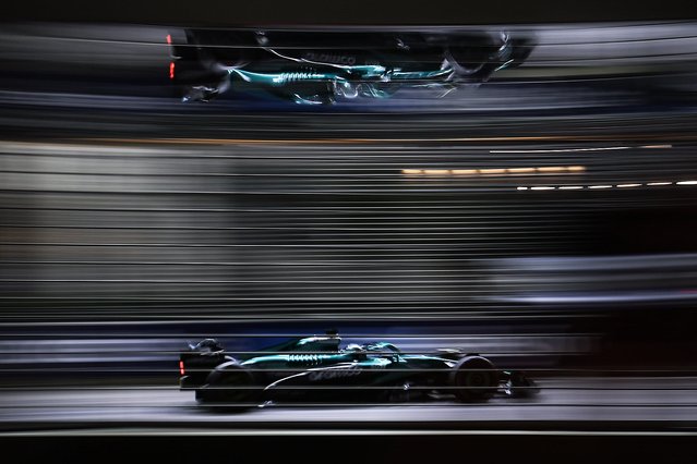 Image taken with slow shutter camera shows Aston Martin driver Lance Stroll of Canada drives during a free practice session for the Formula One Singapore Grand Prix in Singapore, 03 October 2025. The 2025 Formula 1 Singapore Grand Prix is held at the Marina Bay Street Circuit on 05 October. (Photo by Fazry Ismail/EPA)