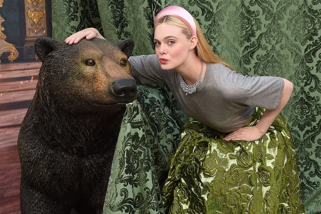 At an event for her show “The Great”, American actress Elle Fanning cozies up to a fortunately fake teddy in Los Angeles, California on May 10, 2023. (Photo by Frank Micelotta/PictureGroup for Hulu/Rex Features/Shutterstock)