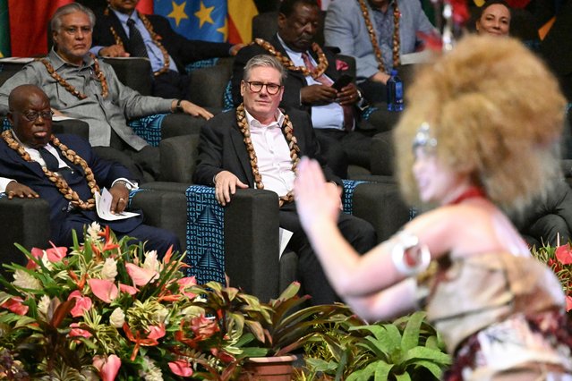 Britain's Prime Minister Keir Starmer watches as dancers perform during the opening ceremony for the Commonwealth Heads of Government Meeting (CHOGM) in Apia, Samoa, on October 25, 2024.(Photo by William West/AFP Photo)