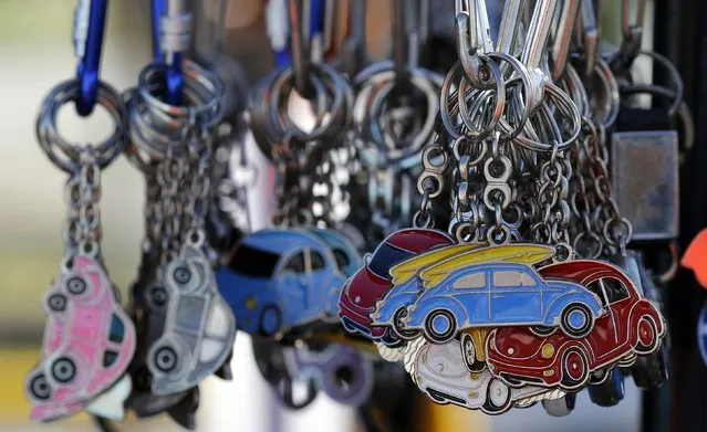 Volkswagen Beetle keychains are displayed during a Volkswagen Beetle owners' meeting in Sao Bernardo do Campo January 25, 2015. (Photo by Paulo Whitaker/Reuters)