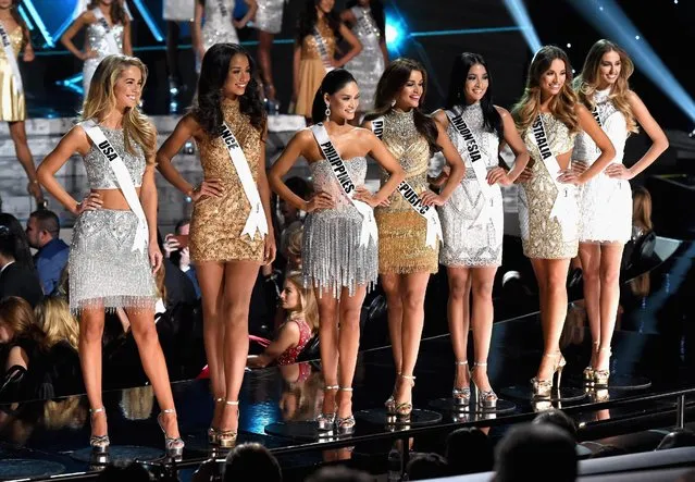 The top 15 finalists (L-R) Miss USA 2015, Olivia Jordan, Miss France 2015, Flora Coquerel, Miss Philippines 2015, Pia Alonzo Wurtzbach, Miss Dominican Republic 2015, Clarissa Molina, Miss Indonesia 2015, Anindya Kusuma Putri, Miss Australia 2015, Monika Radulovic, Miss Brazil 2015, Marthina Brandt, compete during the 2015 Miss Universe Pageant at The Axis at Planet Hollywood Resort & Casino on December 20, 2015 in Las Vegas, Nevada. (Photo by Ethan Miller/Getty Images)