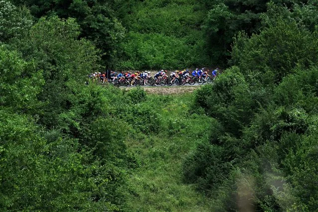 A general view of the peloton passing through a landscape during the 34th Giro d'Italia Donne 2023, Stage 4 a 134km stage from Fidenza to Borgo Val di Toro / #UCIWWT / on July 03, 2023 in Borgo Val di Toro, Italy. (Photo by Dario Belingheri/Getty Images)