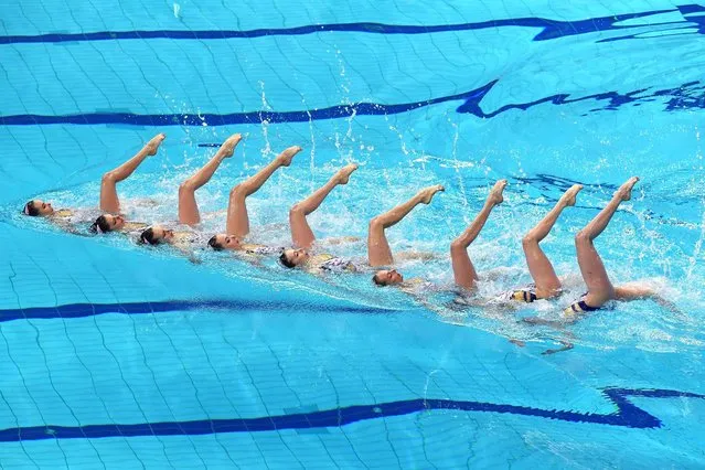 Ukraine's team compete in the final of the Team Technical Artistic Swimming event during the LEN European Aquatics Championships at the Duna Arena in Budapest on May 12, 2021. (Photo by Attila Kisbenedek/AFP Photo)