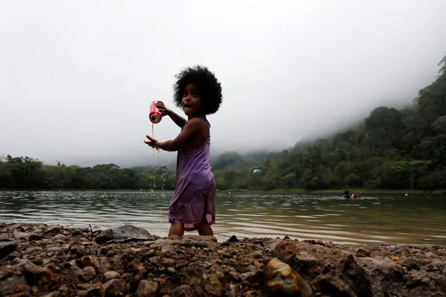 PANAMA: A child plays as she enjoys a day out in Laguna de San Carlos, Panama May 1, 2016. (Photo by Carlos Jasso/Reuters)