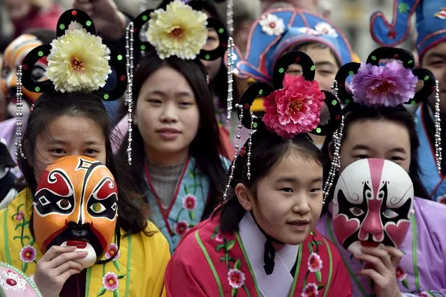 Children take part in a parade celebrating the upcoming Chinese Lunar New Year of the Monkey in Brussels, Belgium, February 6, 2016. (Photo by Eric Vidal/Reuters)