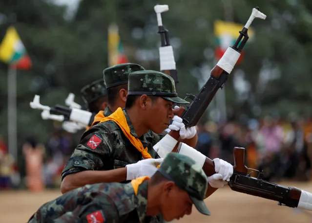 Soldiers from the Shan State Army-South perform a drill as they march in formation during a military parade celebrating the 69th Shan State National Day at Loi Tai Leng, the group's headquarters, on the Thai-Myanmar border February 7, 2016. (Photo by Soe Zeya Tun/Reuters)
