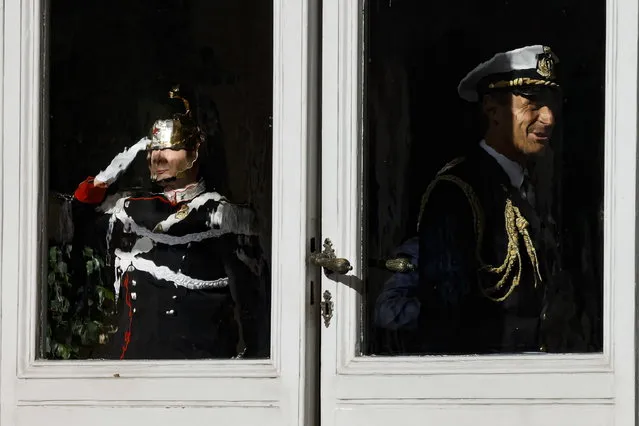 The Corazzieri, the Italian Presidential Guard, stand during the first round of formal political consultations for new government at the Quirinale Palace in Rome, Italy, 20 October 2022. (Photo by Fabio Frustaci/EPA/EFE)
