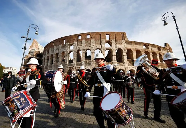 Royal Navy band plays in front of Rome's Colosseum in honour of HMS Albion sailing between Anzio and Civitavecchia, in Rome, Italy on November 29, 2022. (Photo by Yara Nardi/Reuters)