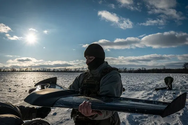 Ukrainian soldiers prepare a long range drone near the Bakhmut frontline, in Donetsk Oblast, Ukraine on January 12, 2024. Drone warfare has become increasingly important as the war entered into a stalemate and both sides are heavily fortified. (Photo by Ignacio Marin/Anadolu via Getty Images)