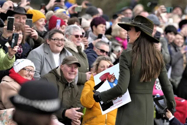 Kate, Princess of Wales smiles at the crowd after attending the Christmas day service at St Mary Magdalene Church in Sandringham in Norfolk, England, Sunday, December 25, 2022. (Photo by Kirsty Wigglesworth/AP Photo)