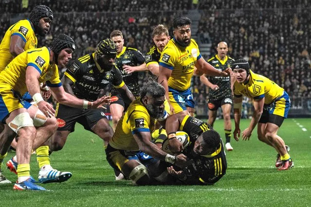 La Rochelle's Georges-Henri Colombe Reazel scores a try during the French Top14 rugby union match between Stade Rochelais (La Rochelle) and ASM Clermont Auvergne at The Marcel-Deflandre Stadium in La Rochelle, western France on March 3, 2024. (Photo by Xavier Leoty/AFP Photo)