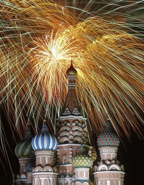 Fireworks explode over St. Basil's Cathedral at Red Square during the Victory Day celebrations in Moscow, Russia, May 9, 2015. (Photo by Maxim Shemetov/Reuters)