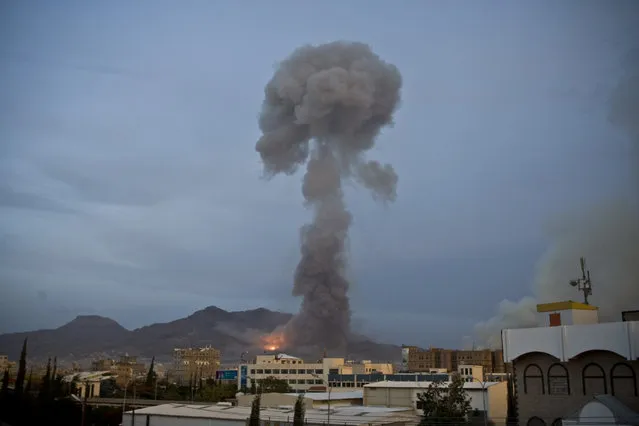 Smoke rises after a Saudi-led airstrike hit a site believed to be a munitions storage, in Yemen's capital, Sanaa, on Monday, May 11, 2015. (Photo by Hani Mohammed/AP Photo)