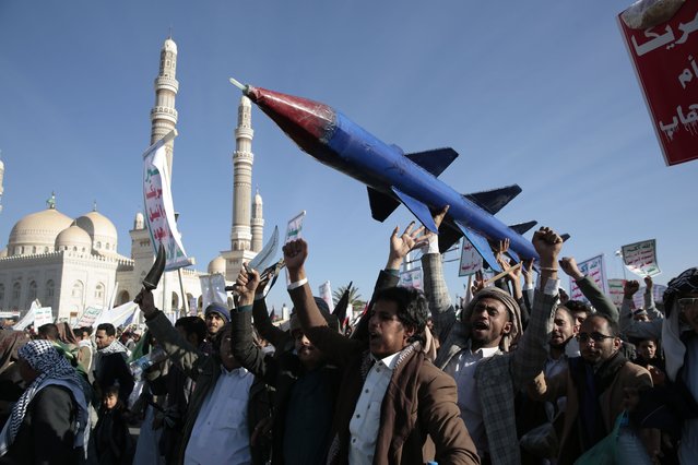 Houthi supporters attend a rally in support of the Palestinians in the Gaza Strip and against the U.S.-led airstrikes on Yemen, in Sanaa, Yemen, Friday, January 26, 2024. (Photo by Osamah Abdulrahman/AP Photo)