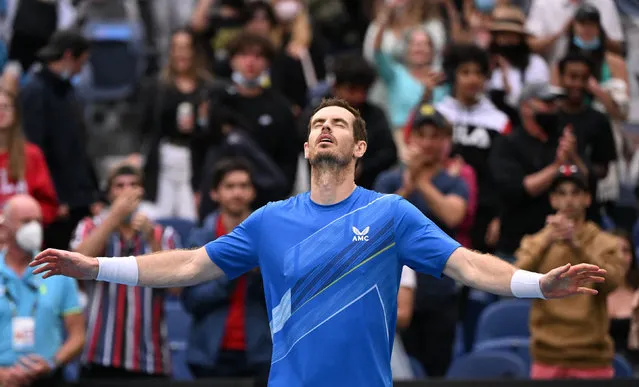 Britain's Andy Murray celebrates after beating Georgia's Nikoloz Basilashvili in their men's singles match on day two of the Australian Open tennis tournament in Melbourne on January 18, 2022. (Photo by James Gourley/Reuters)