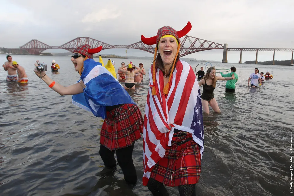 Hardy Swimmers Take A Festive Dip In The Firth Of Forth