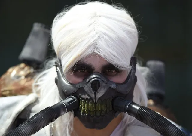 An attendee in costume is seen on the third day of Comic Con International in San Diego, California, July 11, 2015. (Photo by Robyn Beck/AFP Photo)