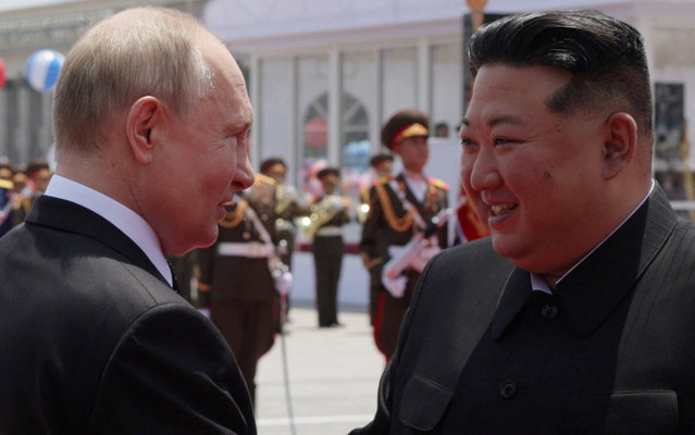 Russia's President Vladimir Putin and North Korea's leader Kim Jong Un attend an official welcoming ceremony at Kim Il Sung Square in Pyongyang, North Korea on June 19, 2024. (Photo by Gavriil Grigorov/Sputnik/Pool via Reuters)