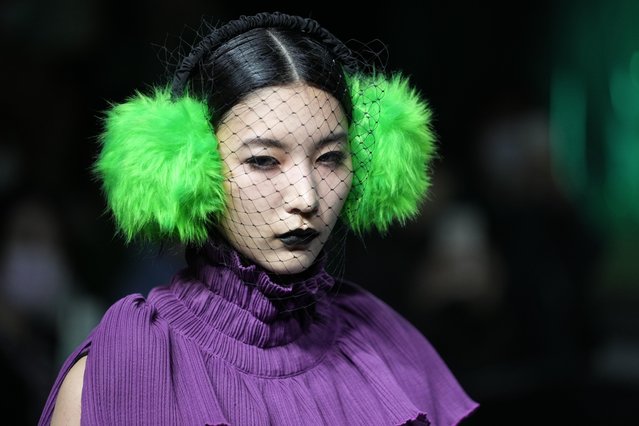 A model presents creations by Japanese designer Ayano Ichige from the Autumn/Winter 2022 collection for the label “NON TOKYO” during the Tokyo Fashion Week in Tokyo, Japan, 14 March 2022. The presentation of the Autumn/Winter 2022 collections runs from 14 to 19 March. (Photo by Franck Robichon/EPA/EFE)
