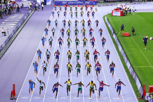 General view as Noah Lyles of Team United States competes the Men's 100m Final on day nine of the Olympic Games Paris 2024 at Stade de France on August 04, 2024 in Paris, France. Layers of the Games shows in one image the multiple moments that happen during a game or a day of competition during the Paris 2024 Olympic Games from a fixed camera. (Photo by Hector Vivas/Getty Images)