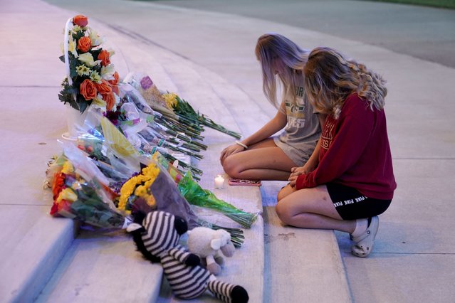 People attend a vigil at Jug Tavern Park following a shooting at Apalachee High School in Winder, Georgia, U.S. September 4, 2024. (Photo by Elijah Nouvelage/Reuters)