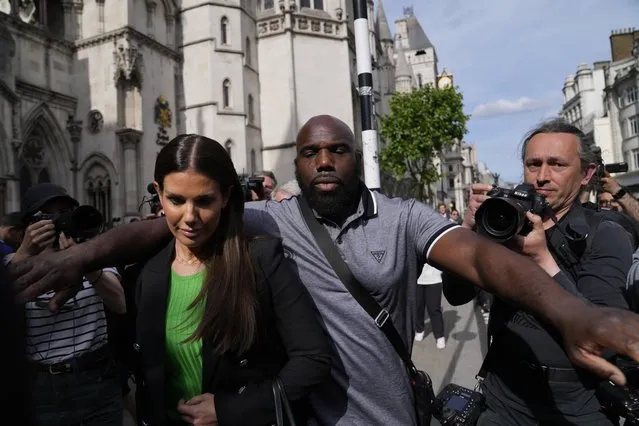 Rebekah Vardy departs the High Court in London, Thursday, May 19, 2022. A trial involving a social media dispute between two soccer spouses has opened in London. Rebekah Vardy sued for libel after Coleen Rooney accused her of sharing her private social media posts with The Sun newspaper. (Photo by Alastair Grant/AP Photo)