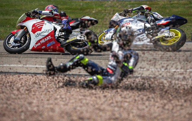 Liqui Moly Husqvarna Intact GP Kalex South African rider Darryn Binder crashes into the gravel during the Moto2 event at the Sachsenring racing circuit in Hohenstein-Ernstthal near Chemnitz, eastern Germany, on June 18, 2023. (Photo by Ronny Hartmann/AFP Photo)