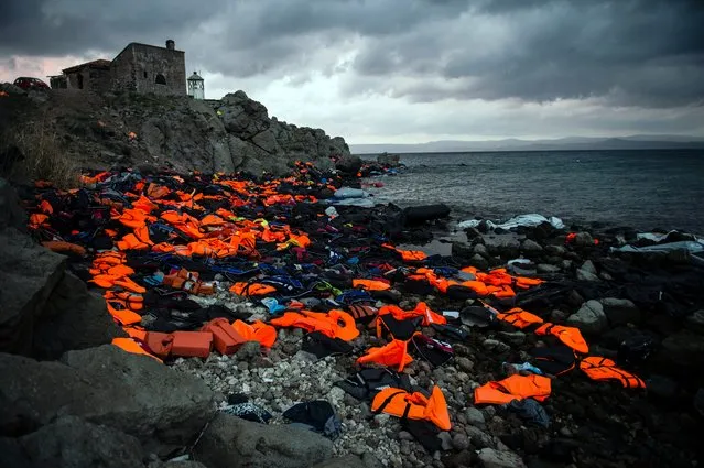 The Ciwem changing climate award 2016 is presented to Sandra Hoyn for her moving photograph “Life Jackets on the Greek Island of Lesbos”. Hoyn, a German photojournalist, concentrates on social, environmental and human rights issues. Her winning photograph depicts the discarded life vests used by refugees to cross to Greece from Turkey, and hints at the enormity of the crises and dangers faced by the refugees. (Photo by Sandra Hoyn/2016 EPOTY)