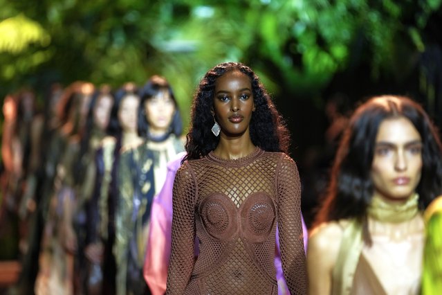 Models wear creations as part of the Roberto Cavalli women's Spring Summer 2024 collection presented in Milan, Italy, Wednesday, September 20, 2023. (Photo by Luca Bruno/AP Photo)