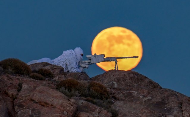 A Turkish sniper at the 13th Border Company Command aims his rifle during patrol duty on the Turkiye-Iran border in Van, Turkiye on December 27, 2023. (Photo by Ozkan Bilgin/Anadolu via Getty Images)