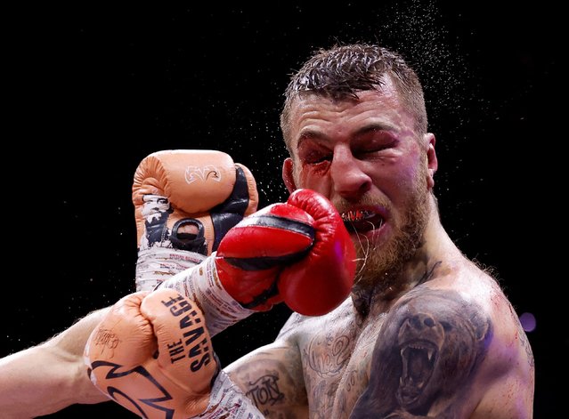 Boxer Sam Eggington is punched by Lee Cutler during their welterweight bout in Birmingham, England, on Sunday, April 20, 2025. Eggington went on to win by decision. (Photo by Andrew Couldridge/Reuters)