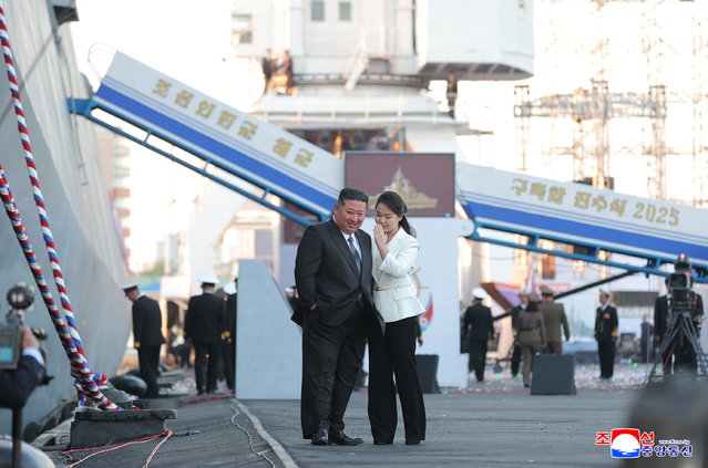 A photo released by the official North Korean Central News Agency (KCNA) on 26 April 2025 shows North Korean Leader Kim Jong Un and daughter Kim Ju Ae attending the launching ceremony of a newly-built destroyer at Nampho Dockyard, North Korea, 25 April 2025, on the founding anniversary of the first armed forces of the Korean People's Army (KPA). (Photo by KCNA/EPA)